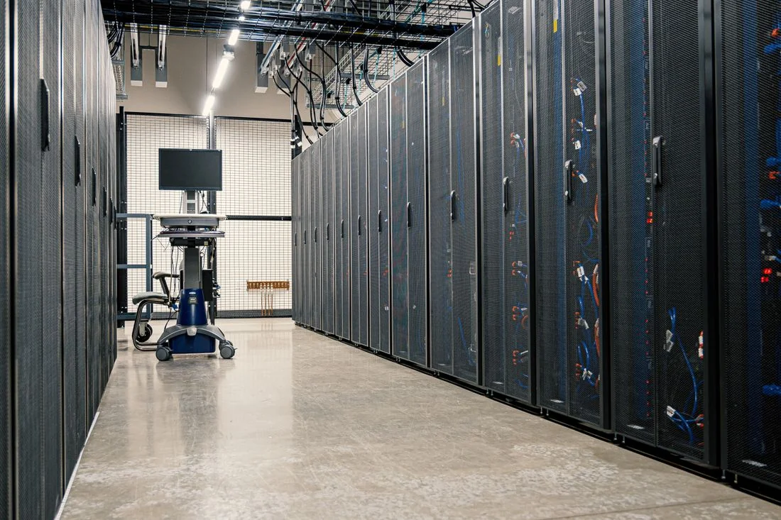Server racks in a technical room.